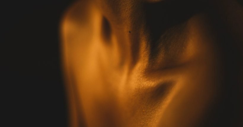 a blurry photo of a person's torso