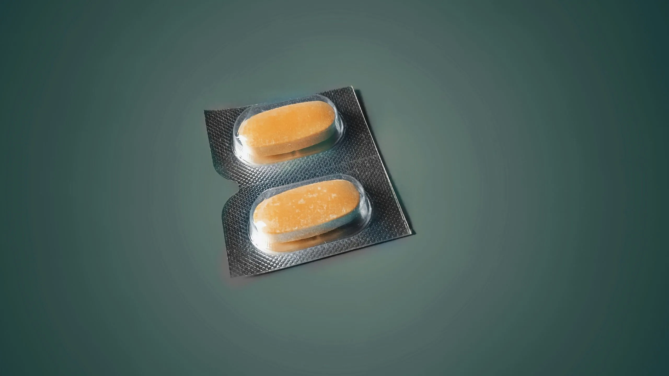 two oval medication pill in blister pack