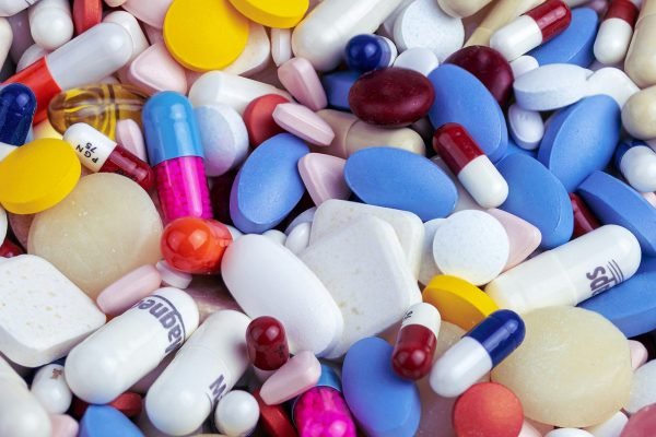 white blue and orange medication pill - ergometrina