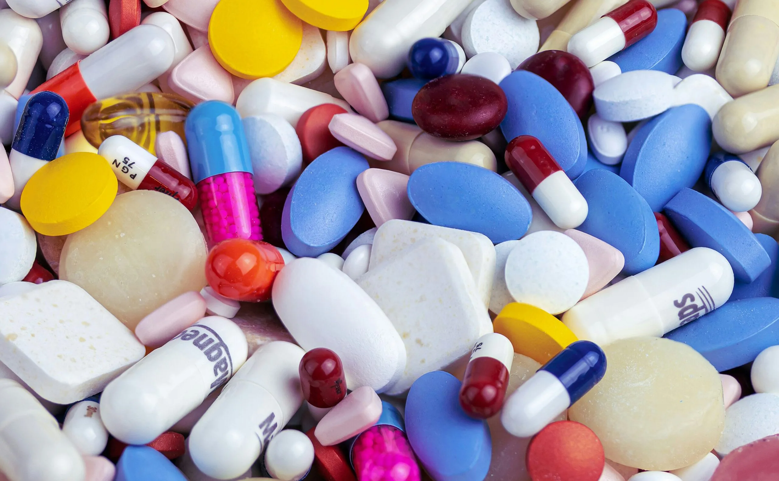 white blue and orange medication pill - ergometrina